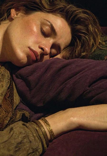 rough painting by Moebius, exhausted woman sleeping on victorian couch, young woman, soft body, oval face, round cheeks, messy and unkempt hair, night time, (drooling from parted lips, saliva on chin), detailed textures, simple necklace, soft dark colours,