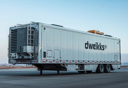 1 vehicle, 
cyberpunk  oversize  industrial trailer.  
Logo label "BDwerks®" written on the side nothing else written.