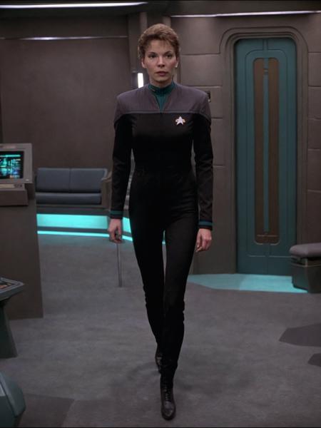 young woman in black and grey ds9st uniform,teal collar,in dsnstation room<lora:DS9XL:0.8>