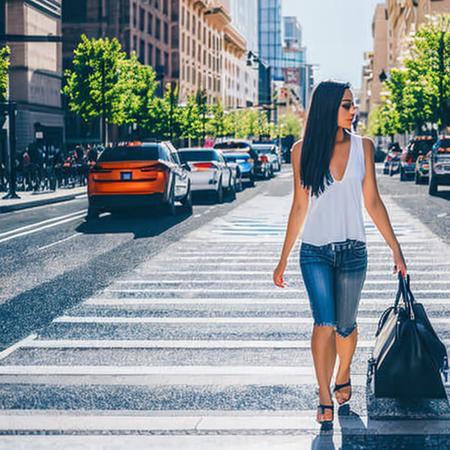 hyper-realistic, mfs shot, best quality, high detail, masterpiece, high quality, summer streetwear, (midriff:1.3), bloom, film grain, detailed eyes, beautiful face, (skinny:1.2), (young female:1.3), city background