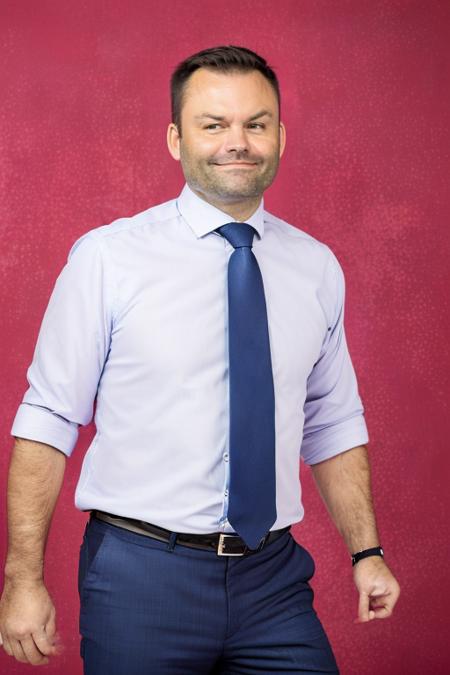 RAW Photo portrait of pspp man,  looking relaxed, (solid color studio background:1.2)