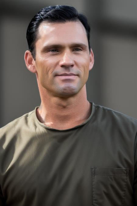 a man <lora:jeffreyDonovan:1>, combed back black hair, orange prison uniform, upper body, close up, RAW, 8K, UHD, highly detailed face, candid, amateur, [smiling], prisoners in the background