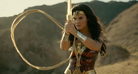 cinematic film still of  Cinematic Film stock footage in (arri alexa style) Kodak film print,  <lora:Wonder Woman:1> Wonder Woman 1 woman in a Wonder costume professionally holding a shiny golden Perfect Lasso , shallow depth of field, vignette, highly detailed, high budget, bokeh, cinemascope, moody, epic, gorgeous, film grain, grainy