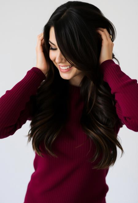 a brunette woman wearing a maroon sweater,she is beautiful,she is smiling in a sexy way