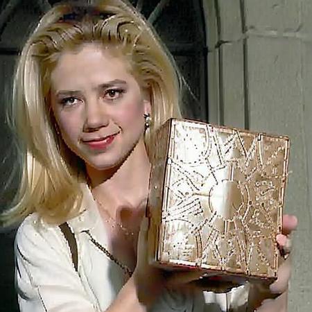 2d, masterpiece, mira sorvino, holding a 3" puzzle box, in her hand, at Hogwarts castle courtyard, ((MILF old)) wrinkles, funny, witch, <lora:hellraiserpuzzlebox:1> <lora:mirasorvino:1> art by akira toriyama,