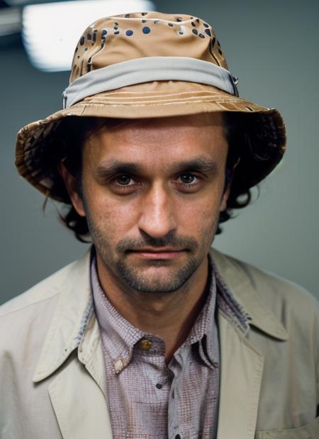 portrait of jc1, messy hair, man in Collared Shirt with Name Tag Patch, Bucket Hat, Handheld Order Device, Cleaning Cloth, Menu Board, epic (photo, studio lighting, hard light, sony a7, 50 mm, matte skin, pores, colors, hyperdetailed, hyperrealistic),  <lora:JohnCazale:1>