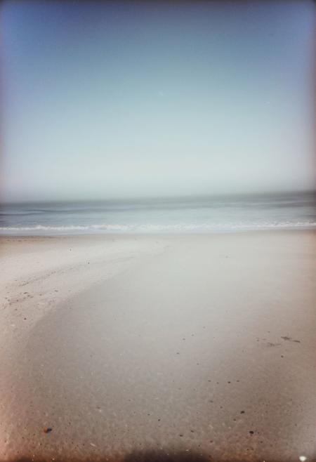 soaked_seasalt,  instagram photo, a foggy beach, hard shadows, film grain