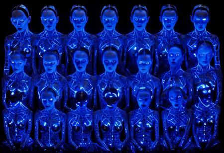 surreal repeated (portraits:1.3) of a cyberwomen intricated in printed circuits, dark contrasted artwork simple circuitery, hyperdetailled, complex infinite repeated faces in multiple shapes and size, multiple various motherboards in chaotic structure assemblage sculpture, creepy horror neon light , album cover  for rhythmic dark hip-hop, aggressive creepy, surrealistic professionnal photography,by Irving Penn , by Hao Nguyen, by Elsa von Freytag-Loringhoven