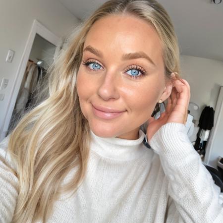 <lora:Kate_Trajkovska:0.6>, blonde hair, pink lips, perfect nose, round cheeks, dimple, smile, black pupils, white crewneck sweater, detailed eyelashes, beautiful, masterpiece,  medium breast,  extremely detailed woman, indoors, purple sports leggings, eyes,  standing,  long hair,  white crew tee sleeve, tanned skin, mature woman, blue eyes