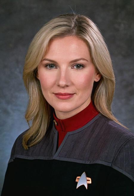 photo portrait of a 28yo ((white woman)), blonde hair, messy, beautiful, (black and grey ds9st uniform), red collar, long sleeves, medium hair,
<lora:DS9XLVGRAD3:0.8>