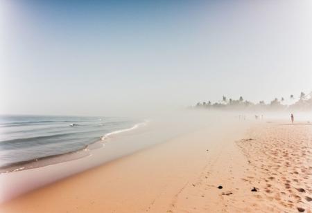 nstagram photo, a foggy beach in sri lanka at noon, hard shadows, film grain, nstagram photo, a foggy beach, hard shadows, film grain