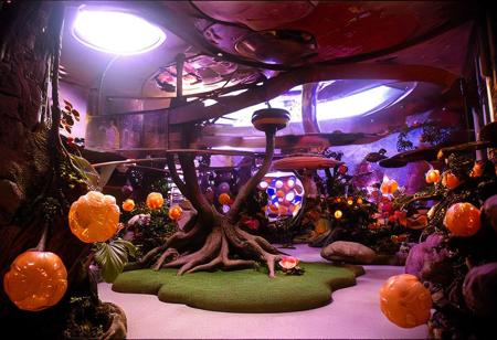 Photograph, masterpiece,best quality, of An astonishing award winning, art installation, the interior of an incredible starship, poly acrylic resin molded tree sculptures, fake plastic flowers, 1970s Brazilian Tropicalia retrofuturism, in the style of Pipilotti Rist, complex shadows, retro, science fiction style
