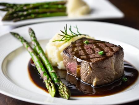 RAW photo, closeup on subject, side view, perfect cut of fillet mignon, cooked rare, dark caramelization, au jus, side of mashed potatoes, side of grilled asparagus, all sitting on a white china plate, steam rising from the food, food photo, DSLR, soft lighting, high quality, film grain, Fujifilm XT
