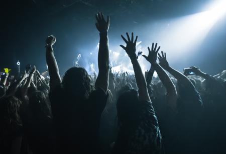 photo of three fans at a rock concert standing in a crowd, cheering, detailed skin, long hair, dark, direct artificial light, motion blurr <lora:mobile:0.8>