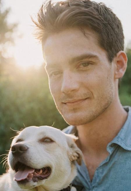 cinematic film still fashion photography portrait of 1man with cute dog as companion, headshot, sunlight , Fine Art & Beauty Photography – ,,light diffraction in frame, dreamy,hazy look.  Helios 44-2 lens mounted on a Praktica MTL 5B Helios 44M-4 lens, 58mm f/2,   in a garden. authentic happy smile towards camera, <lora:hand 4:0.3>