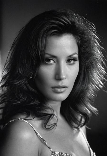 large format photo of an american movie actress of the 1980, long 1980 hairstyle, 35 years old, perfecteyes, half face in shadow, formal 80s dress, body shot, cinematic lightning, ((dimly lit)), ((low key lighting)), ((edge lighting)), silhoutte lightning, ilford hp5 analog film, long exposure, style of george hurrrl