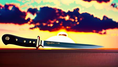 knife on table, sunset, 