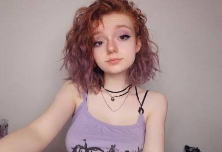 woman, egirl_pfp, makeup
<lora:egirl_pfp:1>, Molly, MJ, auburn hair, greyish violet tank top, violet spaghetti strap tank top, cleavage, polaroid photo, large boobs