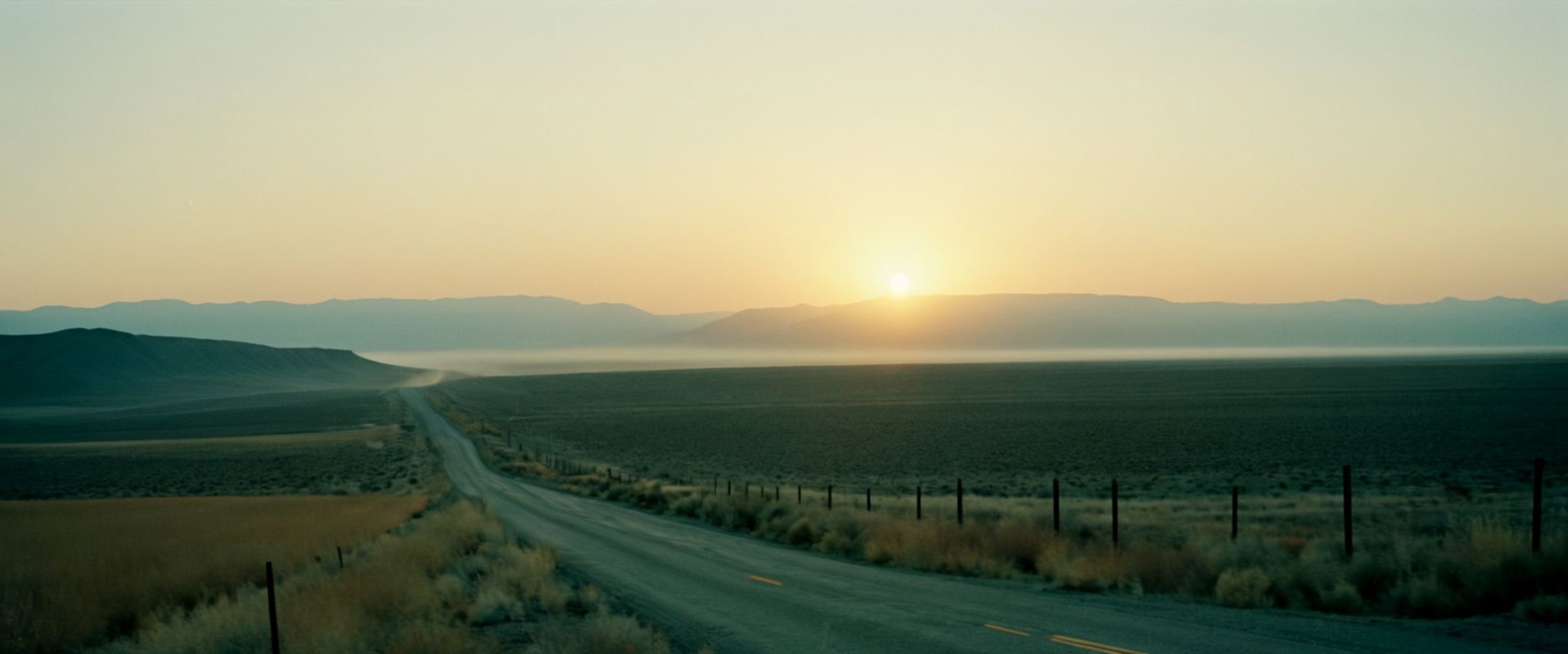 cinematic landscape, <lora:Todd Hido Style:1>Todd Hido Style - Hazy nostalgic image during golden hour that looks like it ...