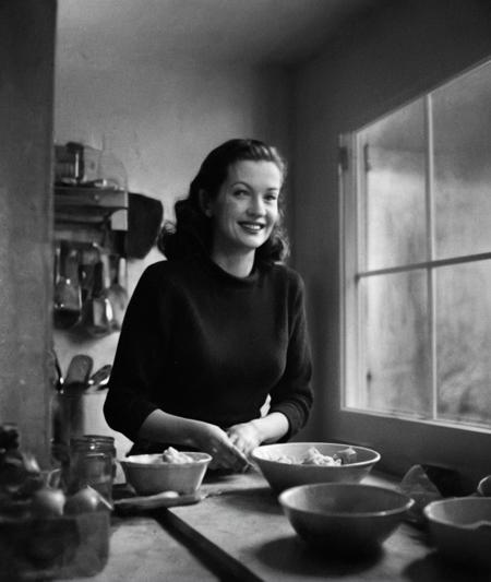 , <lora:nklnor:1> in the style of nklnor, film-noir,                black & yellow, industrial, heavy duty, modular,           A highly detailed mother in her kitchen preparing meal, window sunny day, happy, smiling,