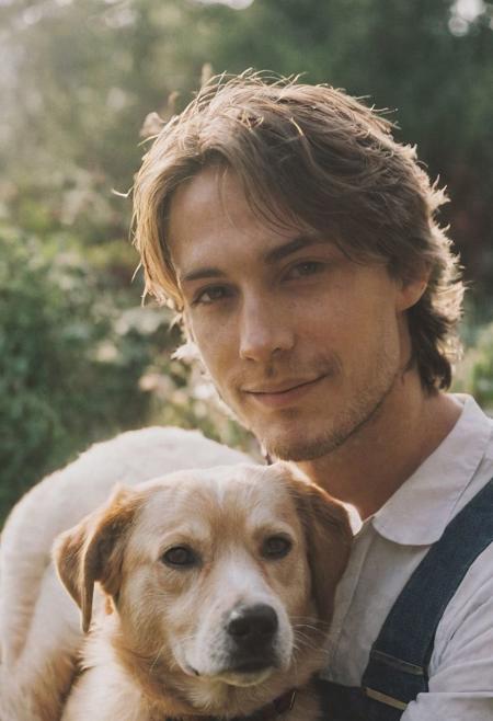 cinematic film still fashion photography portrait of 1man with cute dog as companion, headshot, sunlight , Fine Art & Beauty Photography – ,,light diffraction in frame, dreamy,hazy look.  Helios 44-2 lens mounted on a Praktica MTL 5B Helios 44M-4 lens, 58mm f/2,   in a garden. authentic happy smile towards camera, <lora:hand 4:0.3>
