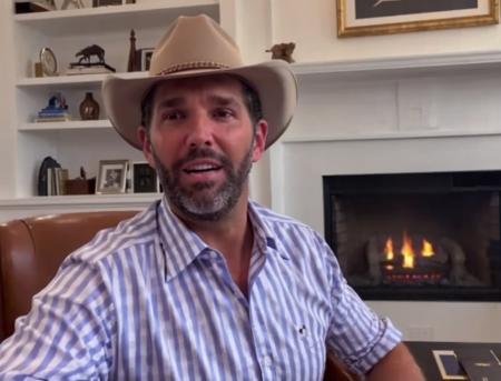 donjr person Wearing a cowboy hat with a suit <lora:Donald Trump Jr. -(Trigger is Donjr Person):1>