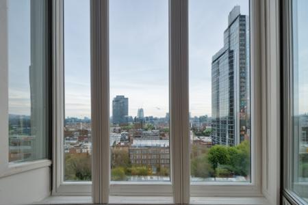 wide angle photo, ovfi, view through window, city apartment block, london, bay windows,  large windows, <lora:buildings view from indoors_epoch_9:0.5>, <lora:add_detail:0.5>, RAW photo, 8k uhd, dslr, soft lighting, high quality, film grain, Fujifilm XT3, lr