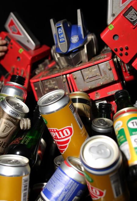 Drunk Transformers, very very drunk, empty beer cans and bottles, wasted.