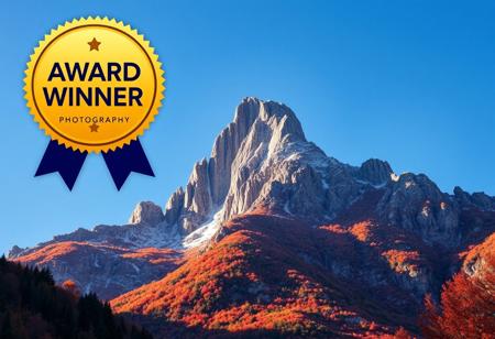 Award-winning photography, towering mountain peak, autumn scenery with vibrant fall colors, clear sky with no clouds, crisp atmosphere, golden and red leaves, sharp mountain textures, dramatic sunlight, wide-angle shot, professional composition, serene and peaceful.