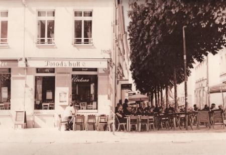lith_argenta_BH1r,  instagram photo, a french restaurant in france, hard shadows, film grain