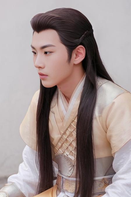 man with long hair yellow hanfu