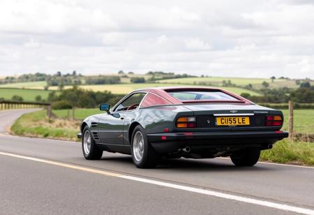 yfg-sde Side view of Aston Martin Virage Shooting Brake 1992 on the road in a picturesque spot in the North Yorkshire countryside.