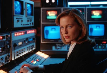 analog film photo (woman Scullyr:1.2), closeup, XFiles, ControlRoom, blue eyes, consoles, screens, lights, neon lights, ((saturated)) . faded film, desaturated, 35mm photo, grainy, vignette, vintage, Kodachrome, Lomography, stained, highly detailed, found footage