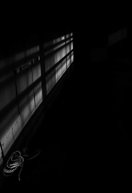 Forgotten Hopes, dramatic lights, dynamic shadows, black and white photography, extremely sad but beautiful environment