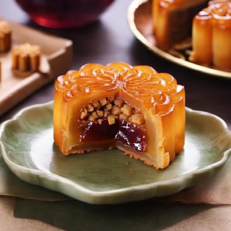 A cut and incomplete mooncake with filling,Cinnamon Wine Stuffing