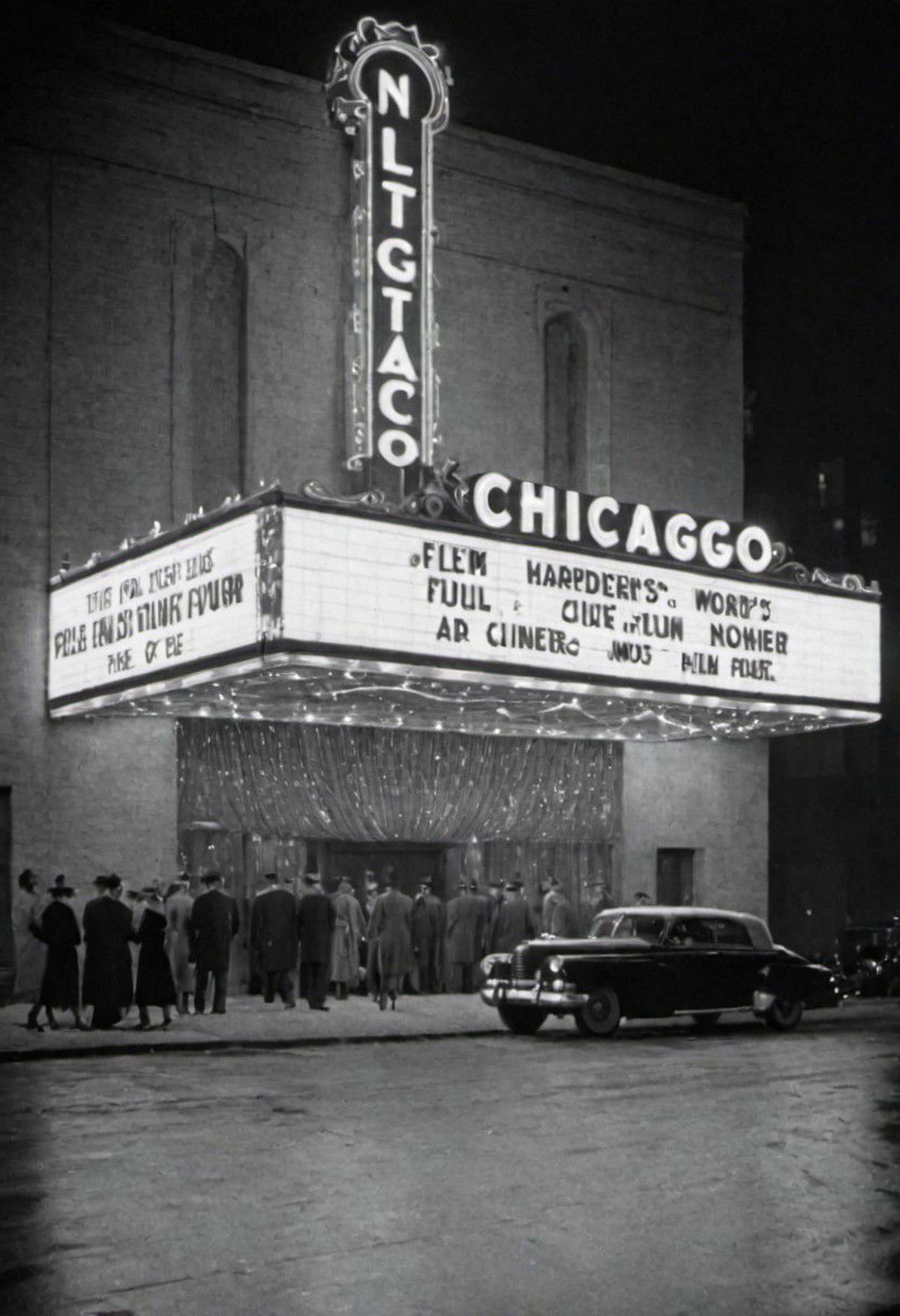 Chicago Theater Marquee at Night with People and Cars