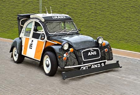 cf_style, (prototype, supercar, Citroen 2cv, rallycar, spoilers, extralarge car rear spoiler, large rocker panels, boosters, visible exhausts, carbon fiber hull:5)(hull reflectivity:-2), (gold accents:2), (neon green outlines:1.2), best artist, best shadows, best lighting, best textures, best contrast, masterpiece, photo realistic, a racing car driving on a professional circuit, (reflectivity:-2),(reflectiviness:-2),

outdoor, god rays, wind, particles, dust, cloud of dust, exhaust gas explosion, official F1 racing circuit, grass, sun, 

Isolated island, boats, sharks, fantasy, giant helmet,
Dynamic angle, source_action_movie, race to the death situation, humor, fun, parody,

<lora:Styles\SDXL\Carbon_Fiber_Style_World_Morph_SDXL_-_Snoodler_-_V2.0>