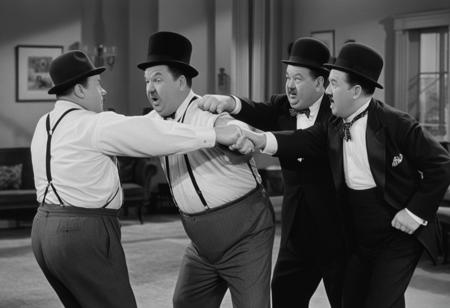 The Three Stooges Versus Laurel And Hardy in a fist fight