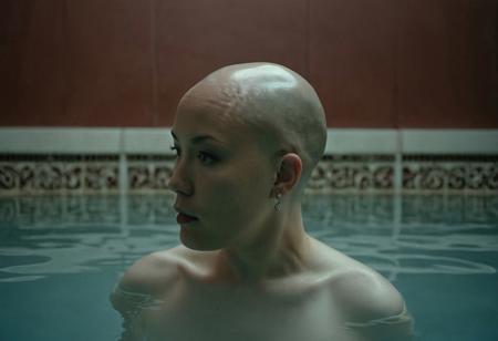 safe_pos, Analog nude full body portrait photograph, 2girls, nude, (1girl beautiful elegant chubby 40yo Asian woman, shaved head )(shiny scalp)(bald head:2),watches as her lover (1girl, beautiful petite pale freckled redhead 28yo white woman), steps out of the pool of ornate huge Moorish Bath, (view from behind), columns, skylights, shot from below, dark chiaroscuro lighting, rich dark cool reds and pale nuetral colors in background, 35mm, realistic, Cinematic Hollywood Film style, high detail, detailed eyes, detailed skin texture, (blush:0.2), (goosebumps:0.3), subsurface scattering, highly detailed skin, skin imperfections, mole, dirty skin, sweat, scar, atmospheric, dramatic, erotic, sensual, rich dark colors, deep shadows, masterpiece, harmonious, vignette, 4k epic detailed, shot on kodak, 35mm photo, sharp focus, high budget, cinemascope, moody, epic, gorgeous, film grain, asz, portrait photo, Art style by Ingres