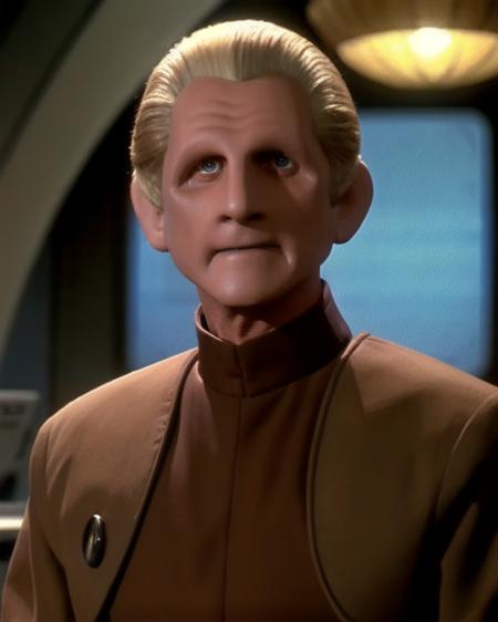 ds9changeling skin like clay featureless face featureless ears no eyebrows slicked back blond hair