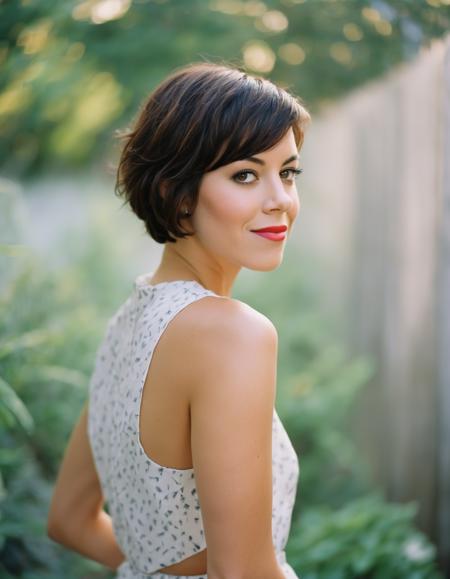 an exquisite portrait photograph, 85mm medium format photo of  (ohwx woman)  <lora:aubrey_lora_sdxl_v1-000008:1>  with a classic haircut