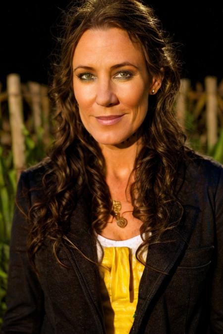hag costume ,  corn maze , night  <lora:Orla_Brady:1> masterpiece, best quality, detailed face,, 1girl, solo, a mature o1873b, brown_eyes, realistic, brown_hair, long_hair, posing,