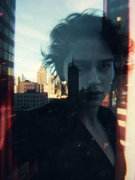 double exposure, ghostly portrait superimposed onto a city, unique perspective, cinematic angle, glitch, chiaroscuro