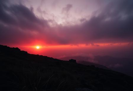 A crimson-hued sunset descends upon a rugged terrain, where wispy clouds and misty fog envelop the landscape in an eerie atmosphere. A dark, muted palette dominates, with deep oranges and purples bleeding into the distant haze. Cinematic lighting casts long shadows, imbuing the scene with dramatic tension. The camera pans across the terrain, capturing every nuance of fine detail, from the wispy grasses to the weathered rocks. A masterpiece of composition and atmospheric mastery, this breathtaking image demands attention.
