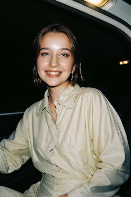 close-up portrait of danilova wearing casual jumpsuit, inside car, (night) <lora:danilova:1> , 1woman closed smile on viewer, pale skin, (round face:1.2), (curvy body:0.4), extremely delicate, intricate details, flashlight illumination, analog film grain, masterful technique, creative refinement, official onlyfans, Best quality, masterpiece, ultra high res, (photorealistic:1.2),  <lora:90sflash_v2:0.55>