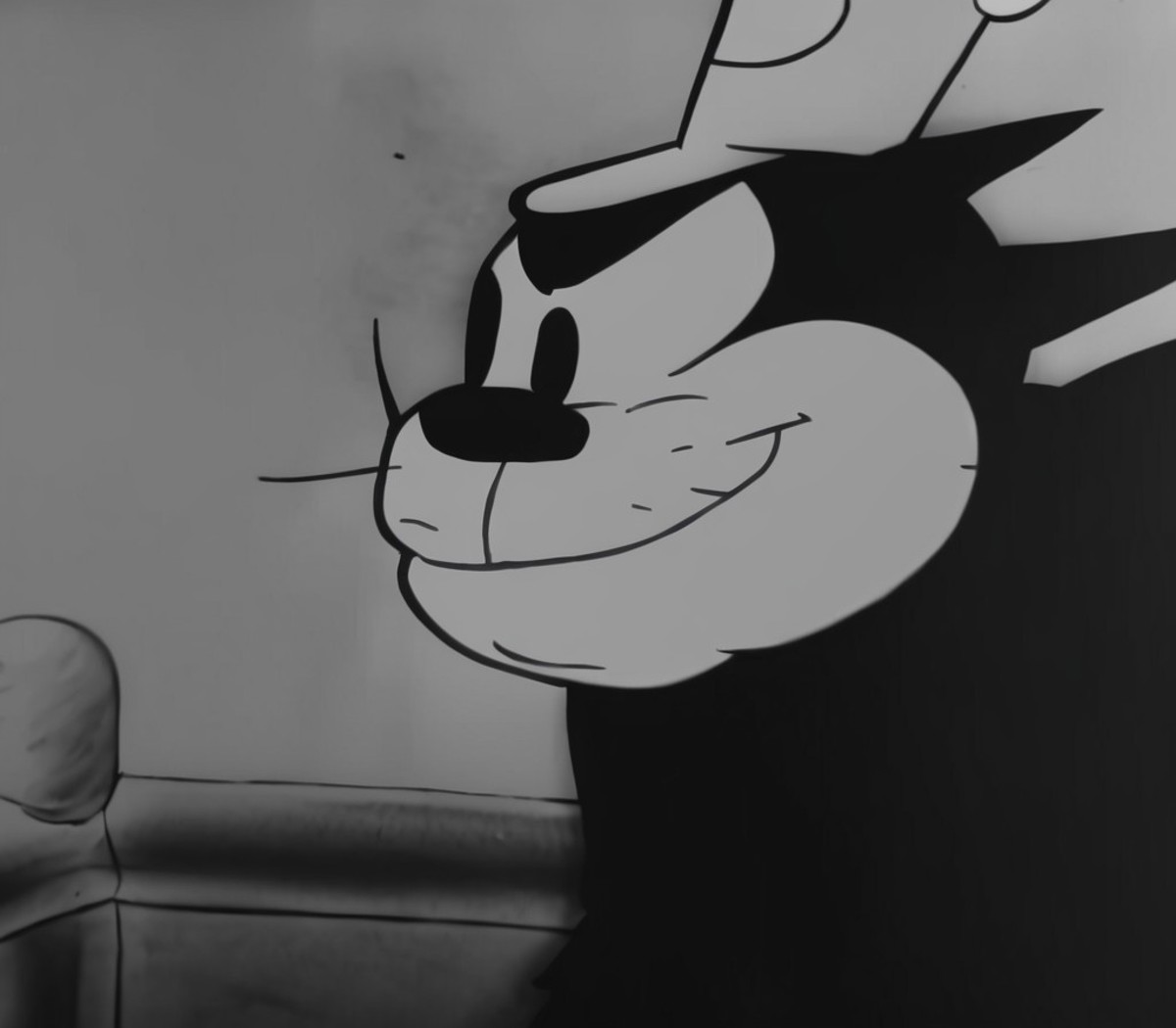1920s animation, pete face closeup, looking left, chewing
<lora:steamboat_willie:1>