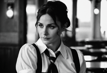 (black and white),  (windy), (pensive), racy itallian waitress serving in old itallian caffee, wrinkles on forehead, (full body), ((eagle nose)), shadows, massive brunette tied bun, (melancholic),((daydreaming)), unkempt, (wide cheekbones), (round face),  (skin moles), (skin pores), ,(cinematic), (bokeh:2), 32  years old sturdy semitic womanbody tight white shirt, black neck tie, suspenders