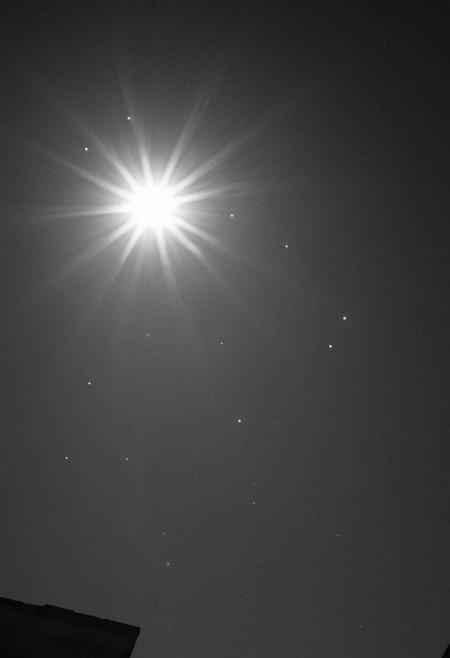 cinematic, ((black and white, monochrome, greyscale)), They can try to tear us down, but the sun comes back around, I feel so light, I feel so free, touch the sky, no gravity, you and me, me and you, is all we to make it through, the moment is now, eyes open wide, tonight, the stars collide, noise, detailed, high quality, cinematic lighting, contrast, heavy dynamic shadows, atmospheric,