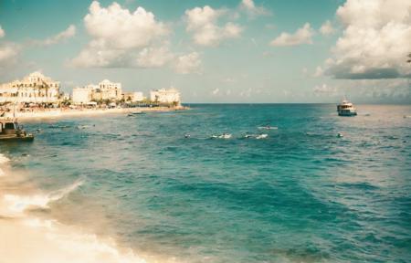 amateur photo of (Havanna:1.2), Cuba in the (1970ties:1.3), (coast and sea:0.9), colorful buildings, panorama, palm trees, (old city:1.1), sea, cliffs, beach, azure, bay, sunny, no clouds, cinematic lighting, golden hour, god rays, 8K, (highly detailed:1.5), (ultra-realistic:1.5), Kodak,  (ag200:1.2) (film grain) <lora:Analog Style Agfa:0.88>