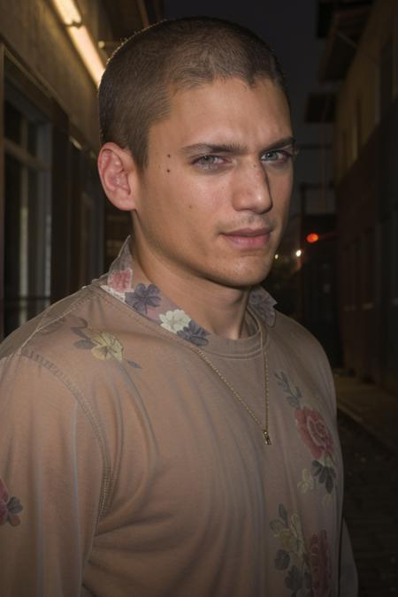 portrait, w3nm1l, handsome man, facial focus, looking at viewer, piercing eyes, handsome face, in an alleyway downtown at night, in a grey beige floral sweatshirt, amateur, candid